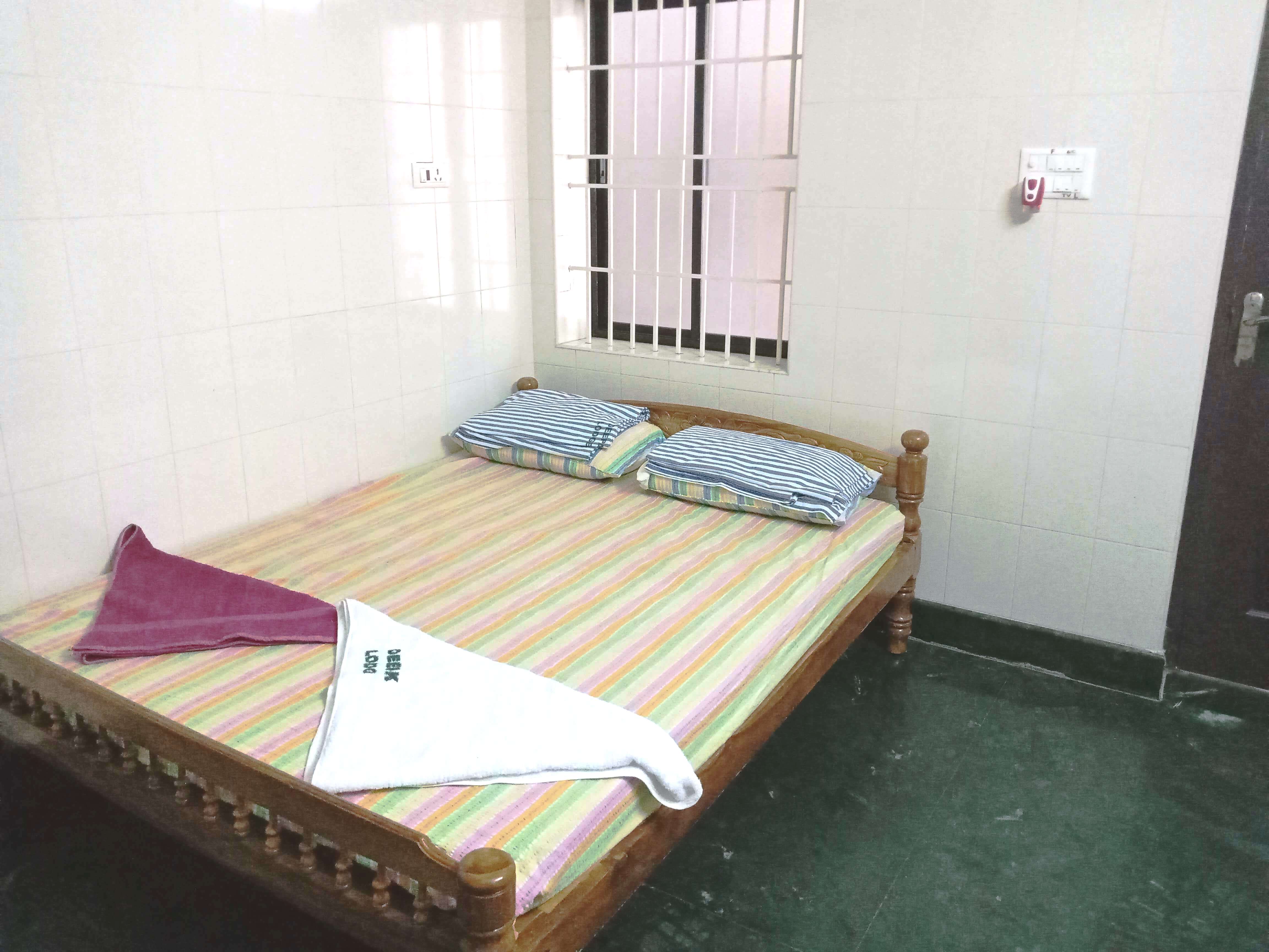 Double Bed — A/C
